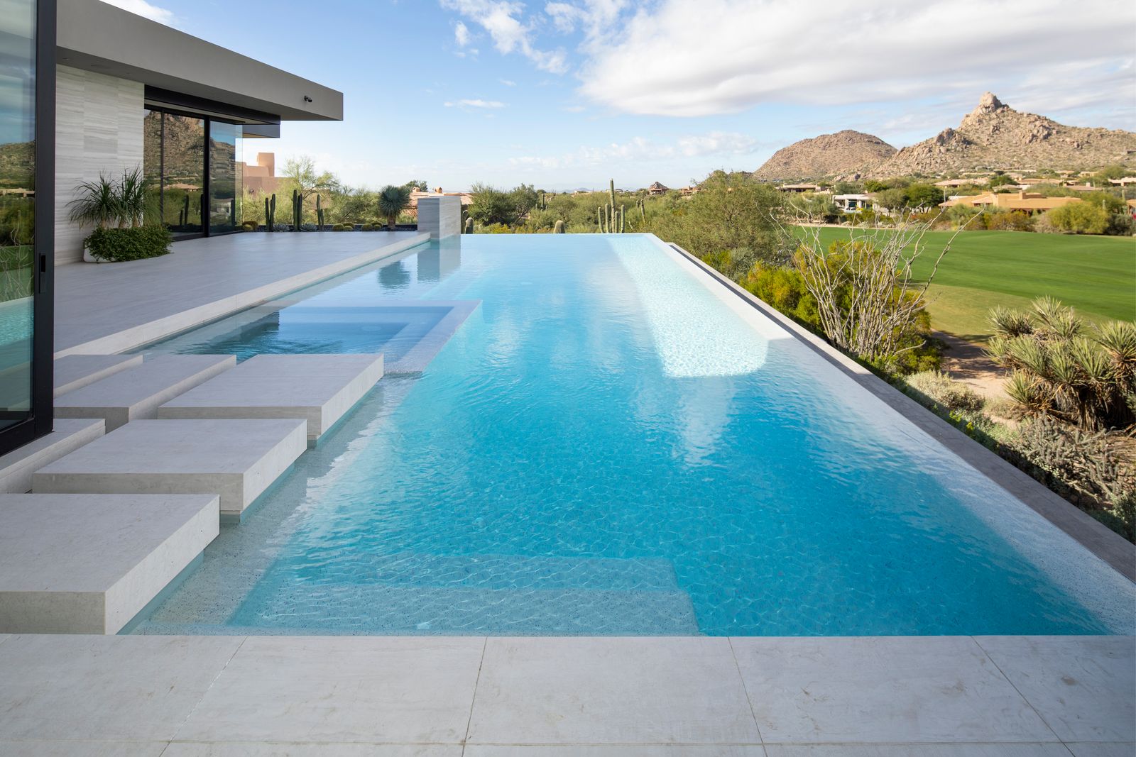 Pool in desert landscape