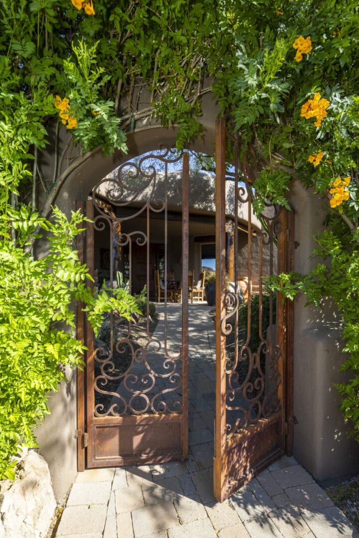 A gate with vines growing on it